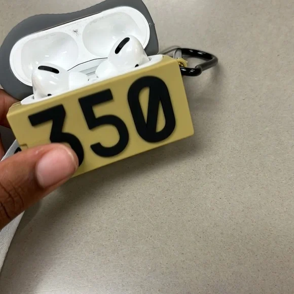 AirPods Pro's with Yeezy air pod case covering